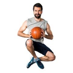 Man playing basketball jumping