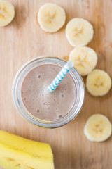 Banana smoothie on wood
 