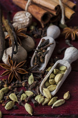 fragrant spices in wooden scoops