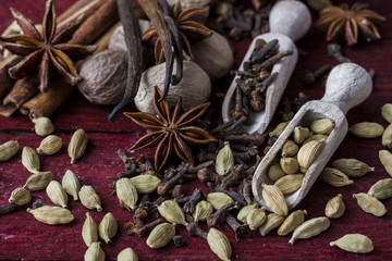 fragrant spices in wooden scoops