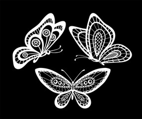 Fototapeta premium set of beautiful black and white guipure lace butterflies isolated.