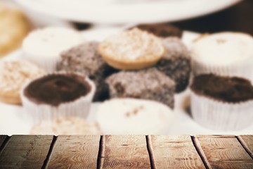 Composite image of wooden desk