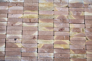 Construction lumber stacked end boards closeup