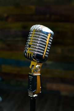 Vintage microphone on dark background