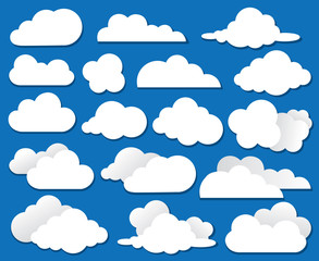collection of clouds silhouettes on blue background
