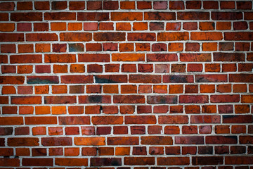 Background of old vintage brick wall with vignette.
