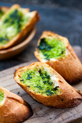 Garlic bread with wild garlic leaves