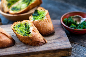 Garlic bread with wild garlic leaves