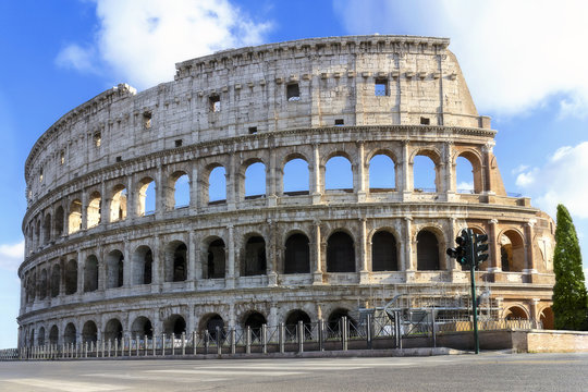 Side view of the famous monument, complete facade of the Colosseum, taken at the end of the restoration, not of people.