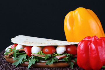 Sandwich with  mozzarella and fresh vegetables