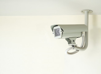 cctv camera installed on ceiling in indoor security system