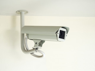 cctv camera installed on ceiling in indoor security system