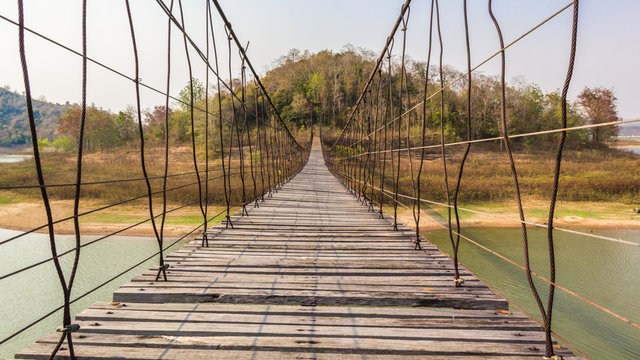 Fototapeta suspension bridge made of wood and sling