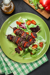 Grilled beef meat and vegetable kebabs