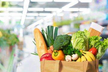 Eco friendly reusable shopping bag filled with vegetables