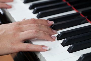 A woman playing piano