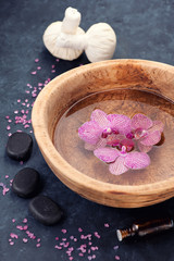 Spa background with orchids and stones zen