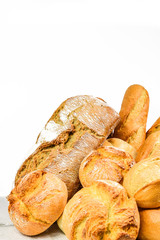 Different types of bread and rolls - obrazy, fototapety, plakaty
