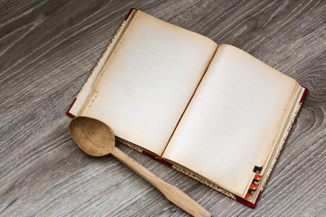 chef book with wooden ladle