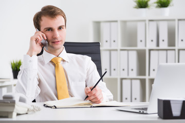 Businessman speaking on phone
