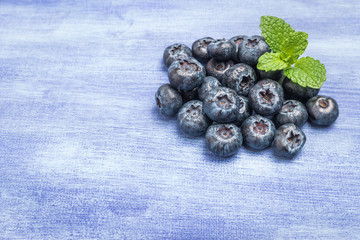Fresh blueberries and mint leaf