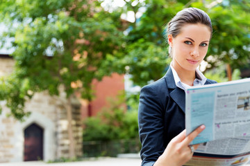Portrait of business woman smiling outdoor