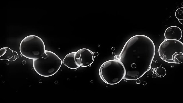Staccato bubble stream on black.