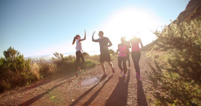 Athletic friends involved in an outdoors running workout