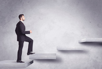 Obraz premium Stepping up a staircase