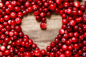 Cranberries background with heart shape