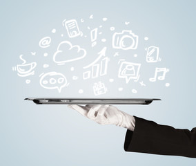 Waiter holding tray with media icons