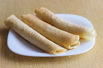 Pancakes on white dish. Selective focus