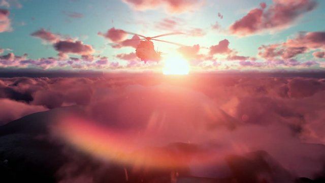 Military Helicopter above clouds at sunset