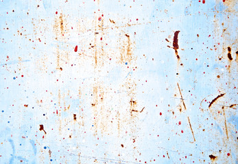 Vintage rusted texture grunge painted on blue metal wall background or Abstract scratched spatter on cracked plaster cement. Vintage and retro for poster background. High quality. Close up