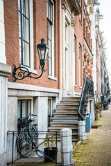 Obraz na płótnie Canvas street view of Traditional old buildings in Amsterdam, the Nethe