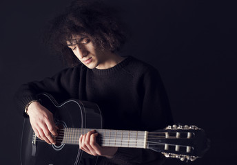 Young man playing guitar