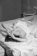 Provocative and sensuality sexy woman with perfect body lying na