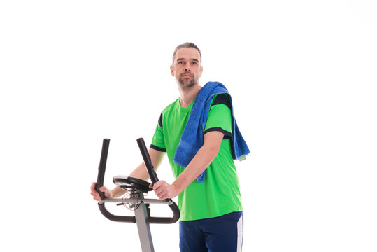 young man train with fitness machine