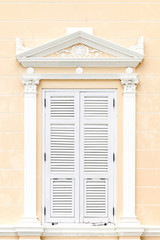 White greek style windows