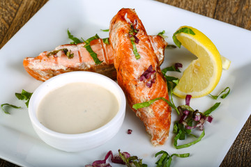 Baked salmon with sauce