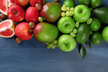 Fruits on dark blue wooden background