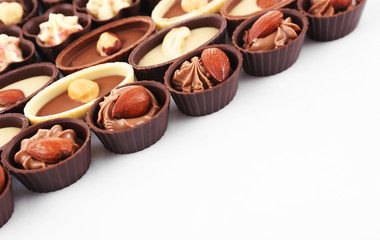 Chocolate sweets isolated on white