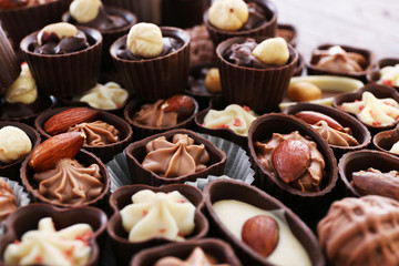 Delicious chocolate candies background, close up