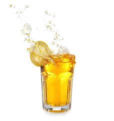 Ice tea with lemon splash, isolated on white © Africa Studio