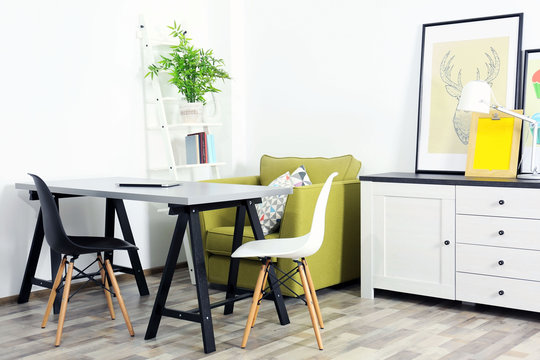 Modern room design. Furniture set with table and chairs