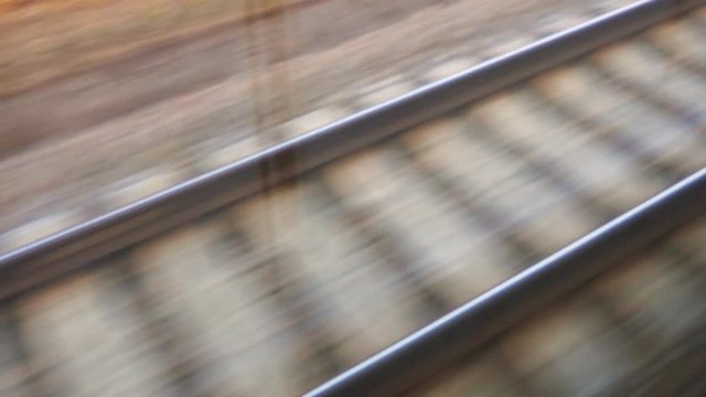The view from the train window on railway tracks