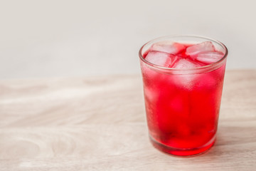 Crimson Tide soda on wooden table