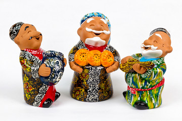 uzbek ceramic souvenirs on white backgraund