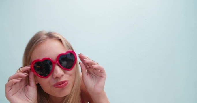 Cute blond girl making duck face