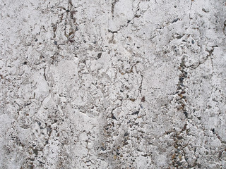 Cracked plaster on the wall. Grunge texture